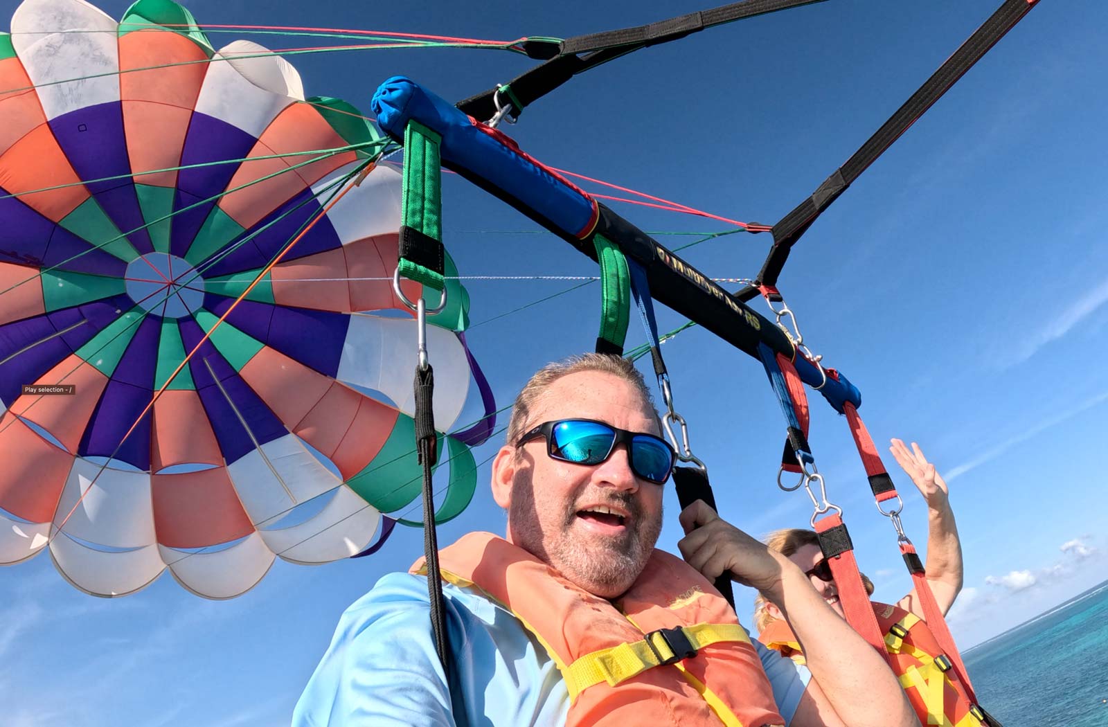 things to do on caye caulker parasailing
