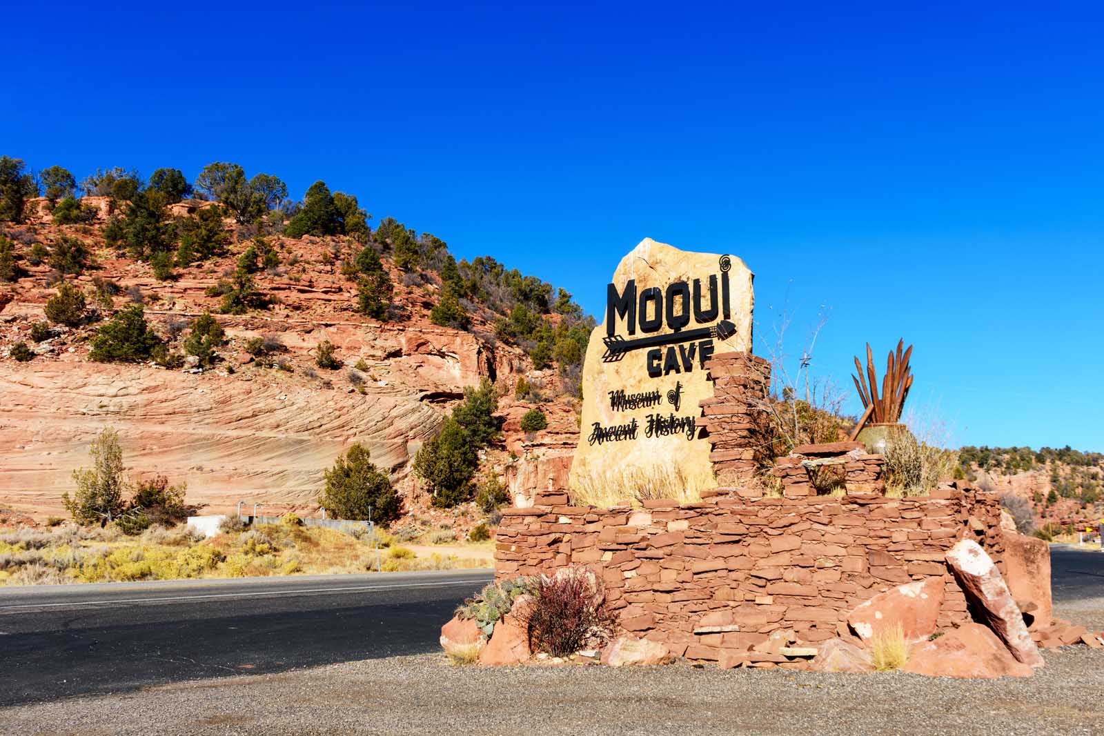 Entrance sign to the Moqui Cave in Utah